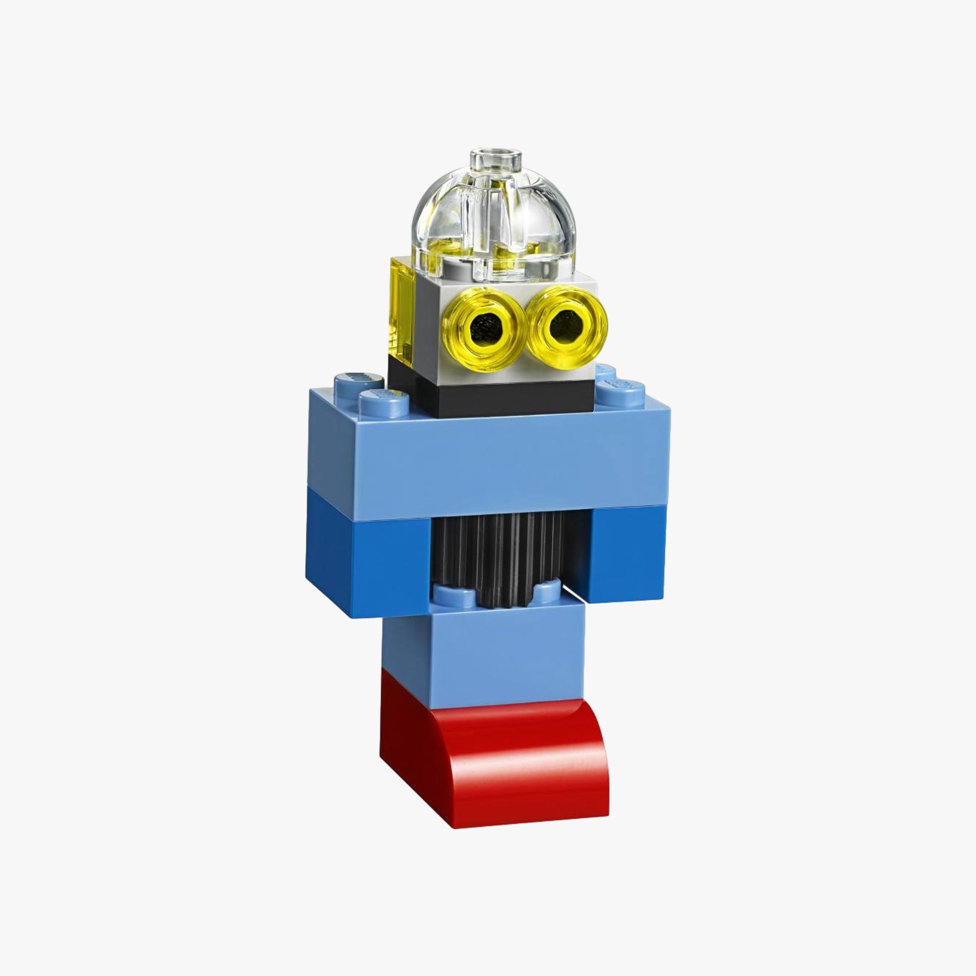 Modelos construídos com a Maleta LEGO Classic 10713: casas, veículos e criaturas coloridas